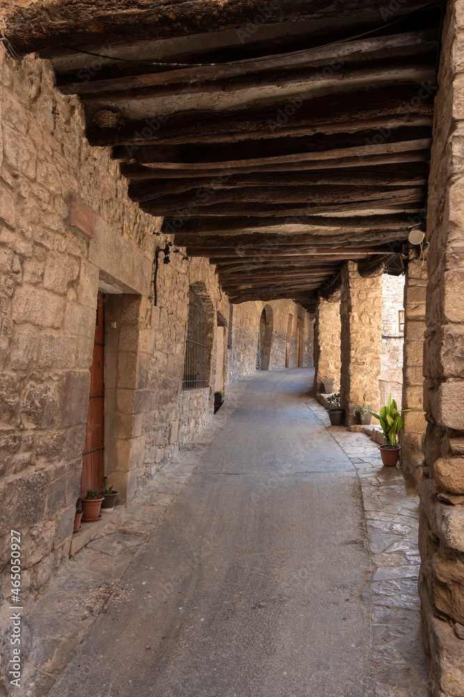 arcaded street in the medieval town of Guimera in Lleida