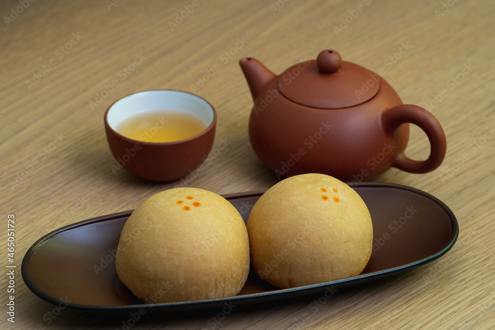 Closeup of mochi Japanese sweets in plate and red tea. Closeup of mochi Japanese sweets in plate and red tea.