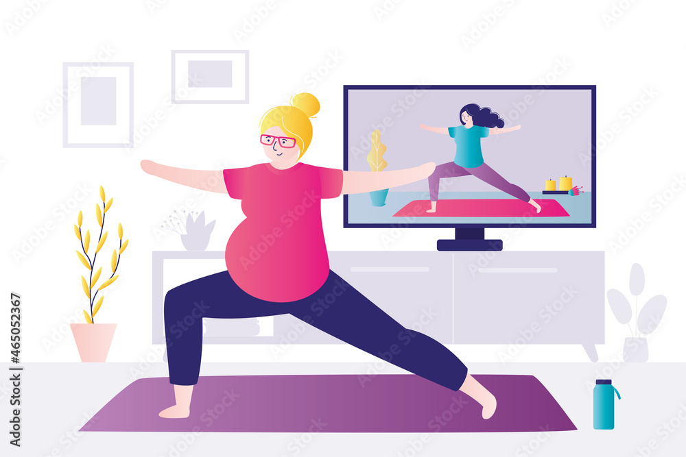 Fototapeta premium Girl practices yoga with trainer online. Woman with pregnant belly stands in warrior pose