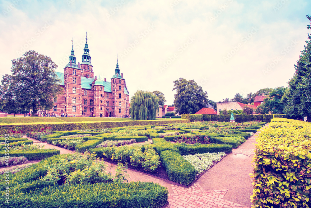Breathtaking magical landscape with park patterns in famous Rosenborg Castle in Copenhagen, Denmark. Exotic amazing places. Popular tourist atraction.