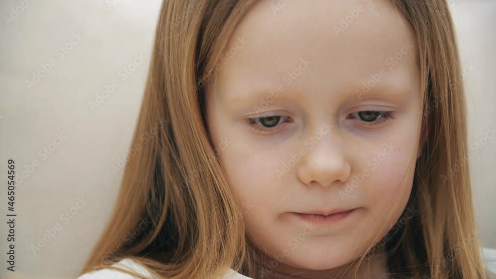 4k close up video of little girl reading a book. 4k close up video of little girl reading a book.