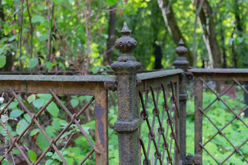 An old grave fence in an abandoned cemetery