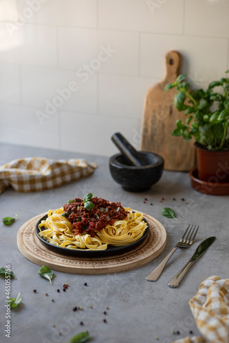 Italian pasta tagliatelle bolognese with basil. photo