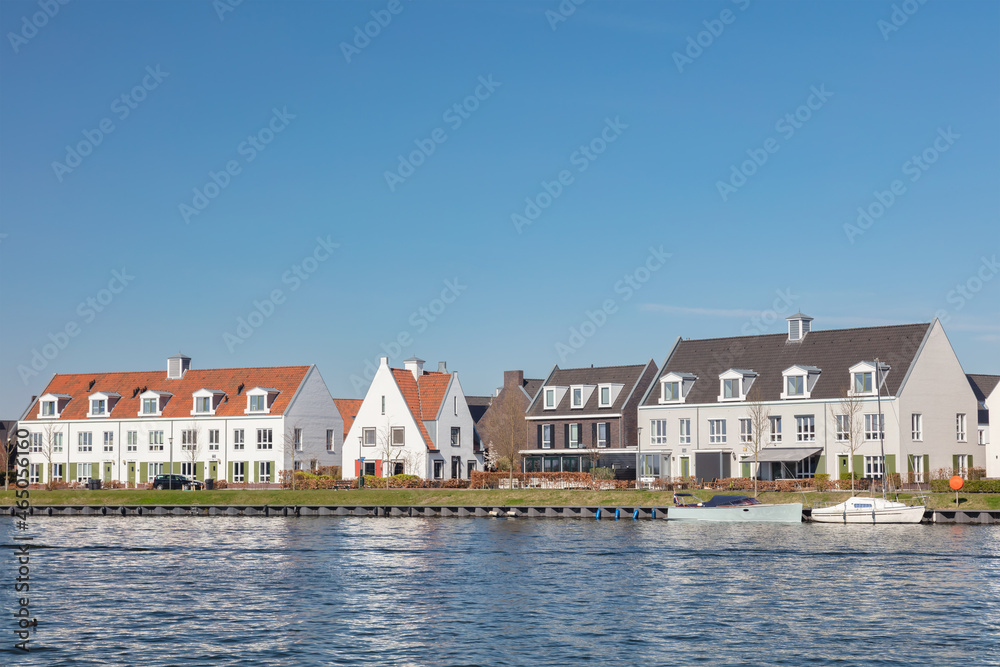 Rows of family homes located on the Veluwemeer waterfront in Harderwijk, The Netherlands Rows of family homes located on the Veluwemeer waterfront in Harderwijk, The Netherlands