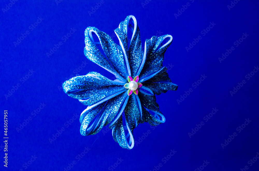 DIY shiny star Christmas toys hang on fir branches DIY shiny star Christmas toys hang on fir branches