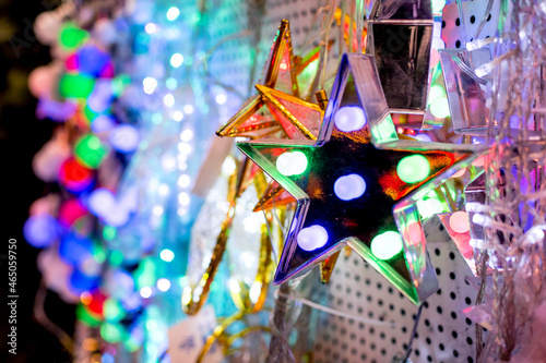 Small starlights and other LED Christmas string lights for sale at a department store. photo