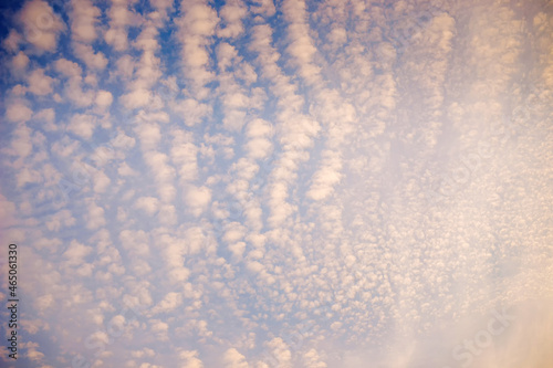Fotografie cloudscape with altocumulus clouds at sunny day