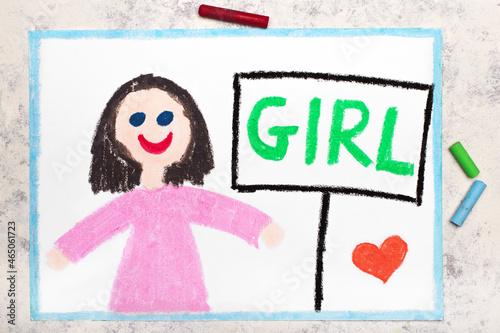 Colorful drawing: Cute smiling girl in pink dress and word GIRL next to her