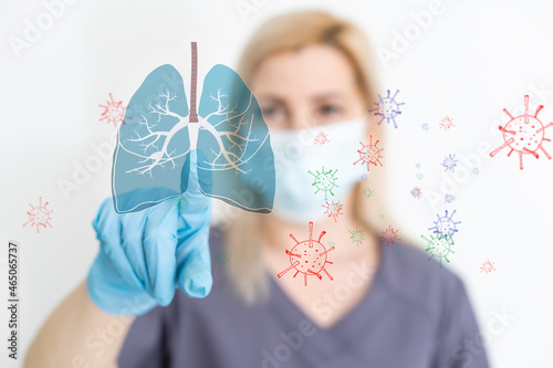 the doctor holds the lungs organ symbol. Awareness of lung cancer, pneumonia, asthma, COPD, pulmonary hypertension, world no tobacco day and eco air pollution. Respiratory and chest concept. photo