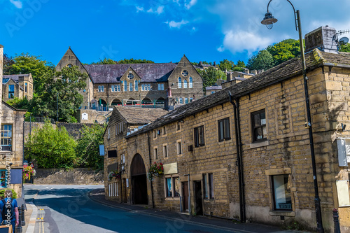 A view down the high street in Hebden Bridge, Yorkshire, UK in summertime photo
