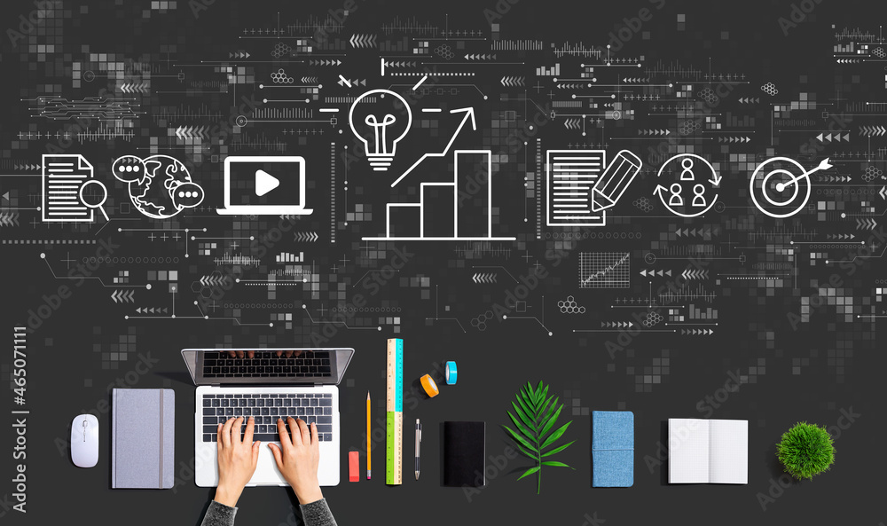 Content marketing concept with person using a laptop computer Content marketing concept with person using a laptop computer