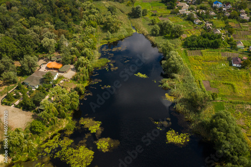 Aerial view of the Tyasmin river in Kamianka town, Ukraine © castenoid