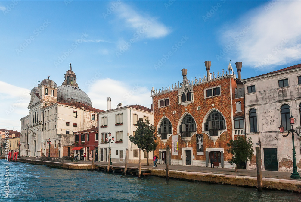 Historical mansions of island of Giudecca under blue day