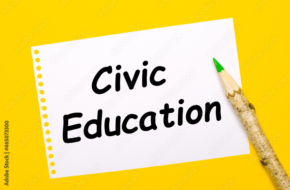 On a bright yellow background, a large wooden pencil and a white sheet of paper with the text CIVIC EDUCATION On a bright yellow background, a large wooden pencil and a white sheet of paper with the text CIVIC EDUCATION