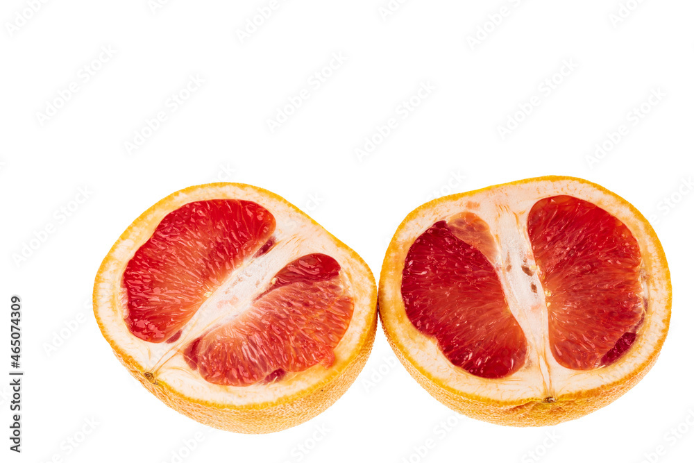 Close up view of ripe red grapefruit cut in half isolated on white background. Healthy eating concept. Close up view of ripe red grapefruit cut in half isolated on white background. Healthy eating concept.