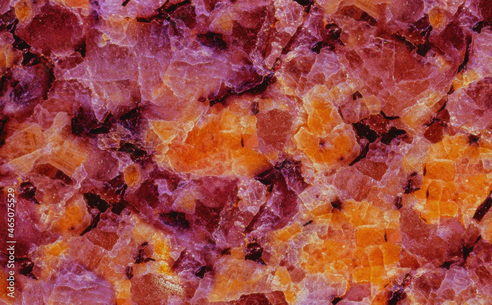 Mineral quartz crystals macro closeup in red and gold Mineral quartz crystals macro closeup in red and gold