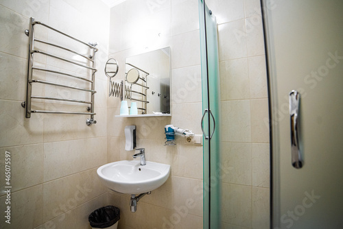 Classic typical bathroom in light interior