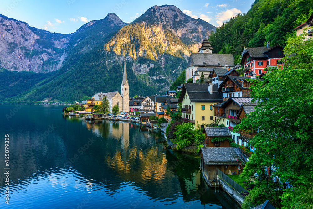 Scenic picture-postcard view of famous Hallstatt mountain village in the Austrian Alps, Salzkammergut region, Hallstatt, Austria. Hallstatt village on Hallstatter lake in Austrian Alps.