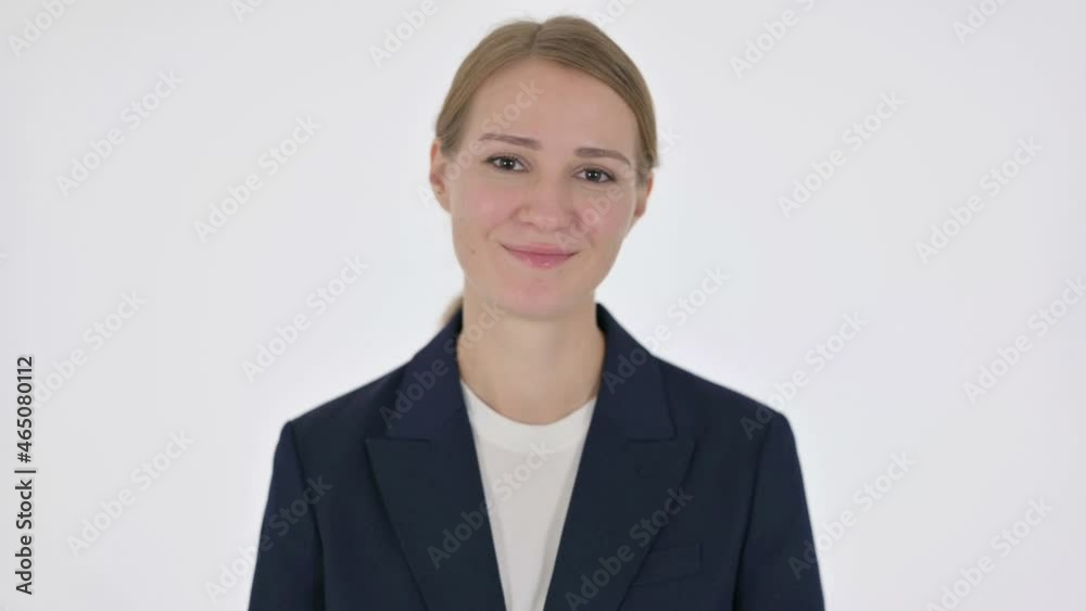 Young Businesswoman showing Heart Shape by Hands on White Background Young Businesswoman showing Heart Shape by Hands on White Background