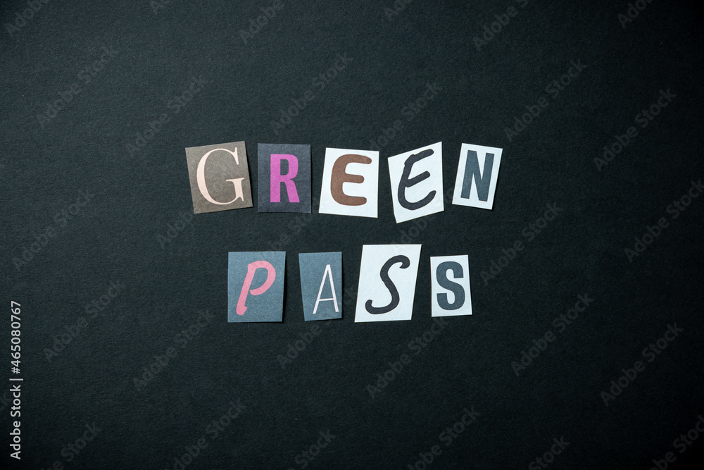 Green pass words. Caption, heading made of letters with different fonts on a dark background. Green pass words. Caption, heading made of letters with different fonts on a dark background.