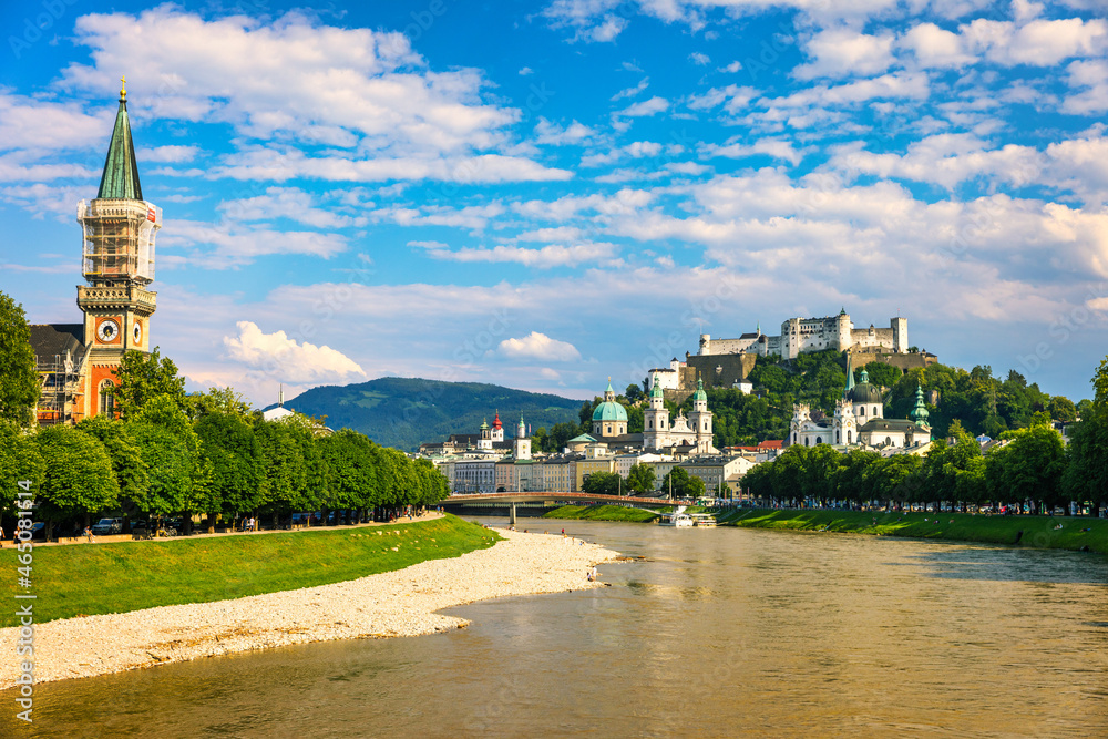 Panoramic view of Salzburg skyline with Fortress Hohensalzburg and river Salzach, Salzburger Land, Austria. Salzburg skyline with river Salzach in springtime, Austria.