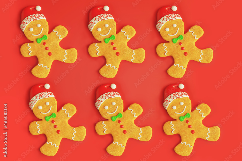 Traditional gingerbread man with icing Christmas new year cookies, flat lay pattern on red background Traditional gingerbread man with icing Christmas new year cookies, flat lay pattern on red background