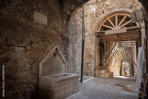 Castelvecchio Calvisio medieval town, narrow streets, watering hole.