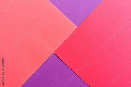 Abstract geometric colorful paper background. Pink,purple and red colors texture for design artworks.