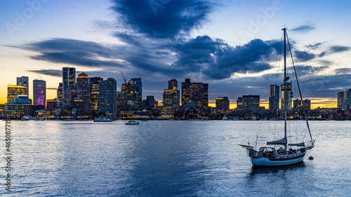 Boston skyline at sunset from the East with clouds