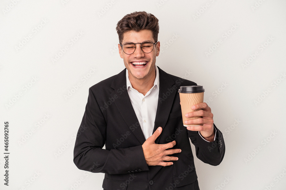 Young business caucasian man holding take away coffee isolated on white background laughing and having fun. Young business caucasian man holding take away coffee isolated on white background laughing and having fun.