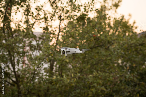 A dji mini 2 drone in action in jena at autumn, copy space