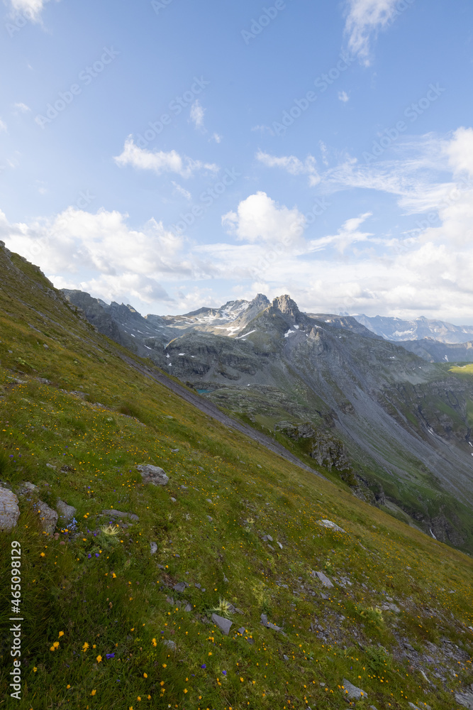 Wonderful view over a beautiful alpine lake in Switzerland called Schottensee. Epic sunrise over a perfect blue lake.