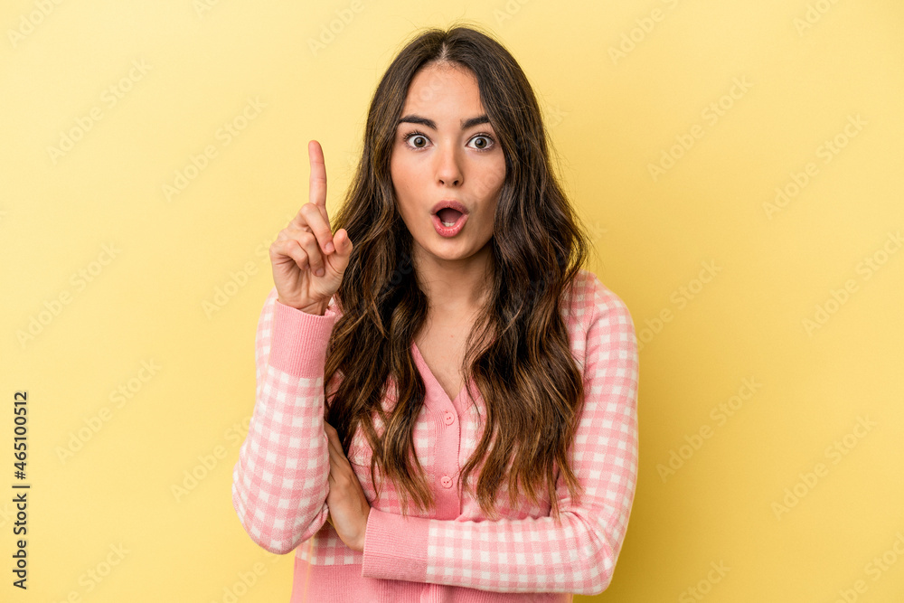 Young caucasian woman isolated on yellow background having some great idea, concept of creativity. Young caucasian woman isolated on yellow background having some great idea, concept of creativity.