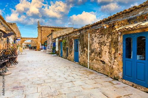 The picturesque village of Marzamemi, in the province of Syracuse, Sicily. Square of Marzamemi, a small fishing village, Siracusa province, Sicily, italy, Europe. © daliu