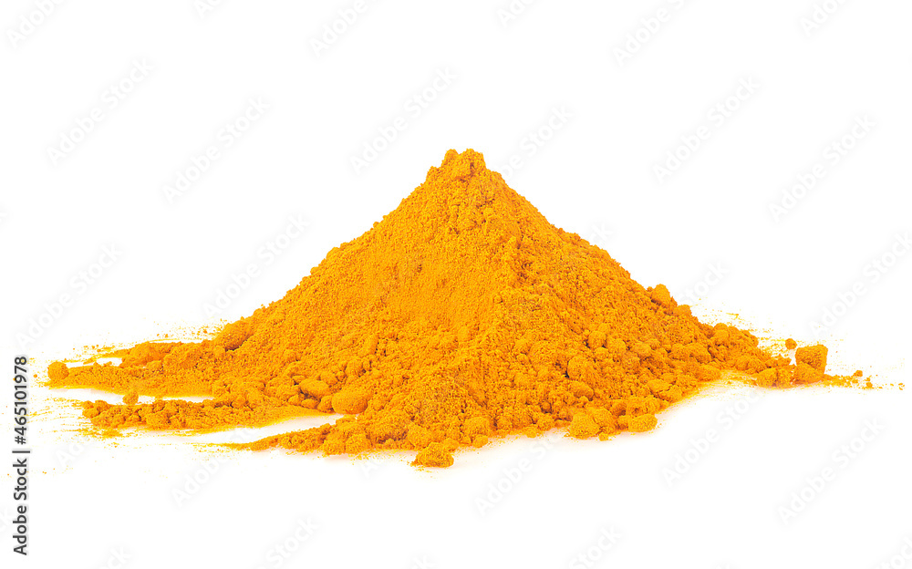 Turmeric powder pile isolated on a white background. Yellow curcuma. Turmeric powder pile isolated on a white background. Yellow curcuma.