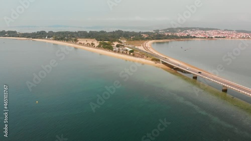 Wallpaper Mural Aerial drone shot of the road linking the bay to an island. turquoise waters in the ocean and cars going through the bridge. beach Torontodigital.ca