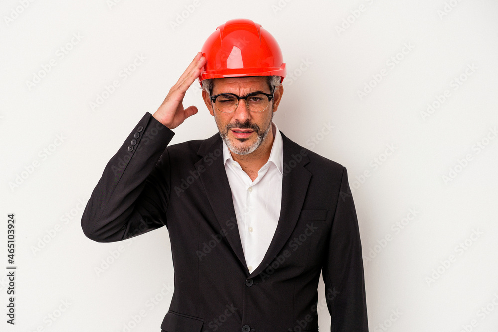 Middle age architect caucasian man isolated on white background being shocked, she has remembered important meeting. Middle age architect caucasian man isolated on white background being shocked, she has remembered important meeting.