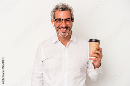 Middle age business man holding a take away coffee isolated on white background happy, smiling and cheerful.