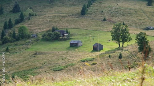 Beautiful view to a picturesque green landscape. Picturesque view of the Ukraine countryside on a beautiful autumn morning. Astonishing morning scene of small village Dzembronya in Carpathian Mountain photo