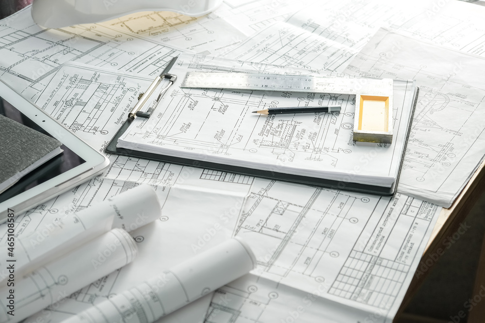 architect design working drawing sketch plans blueprints and making architectural construction model in home.. architect design working drawing sketch plans blueprints and making architectural construction model in home..