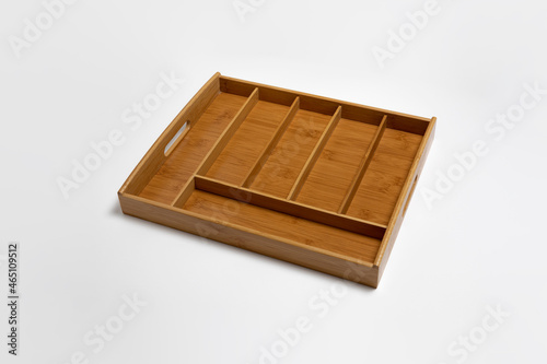 Empty wooden cutlery box isolated on white background.High-resolution photo.