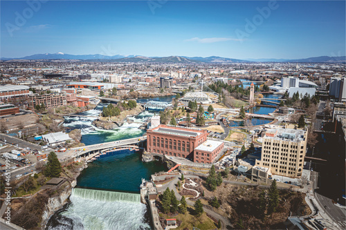 Fototapeta Naklejka Na Ścianę i Meble -  Spokane Washington Skyline and Washington Water Power building and the Post Street Bridge along the Spokane River Aerial vView