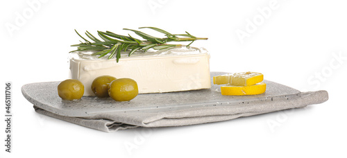 Tasty feta cheese, lemon and olives on white background