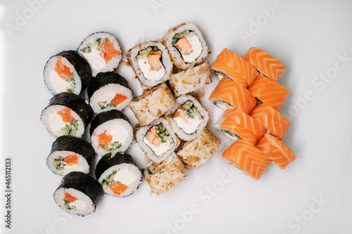 Sushi set with salmon, tuna and cream cheese. Traditional Japanese cuisine.