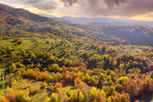 Great panoramic view of morning mountains in many tops in autumn