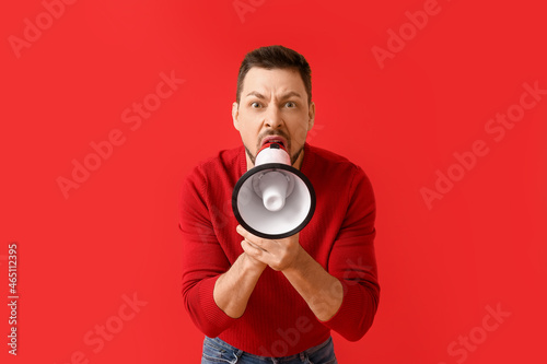 Protesting man with megapho...