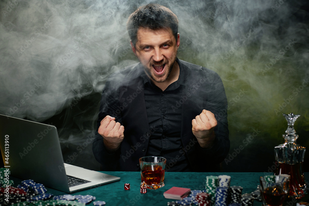 Bearded online casino player man celebrating victory Bearded online casino player man celebrating victory