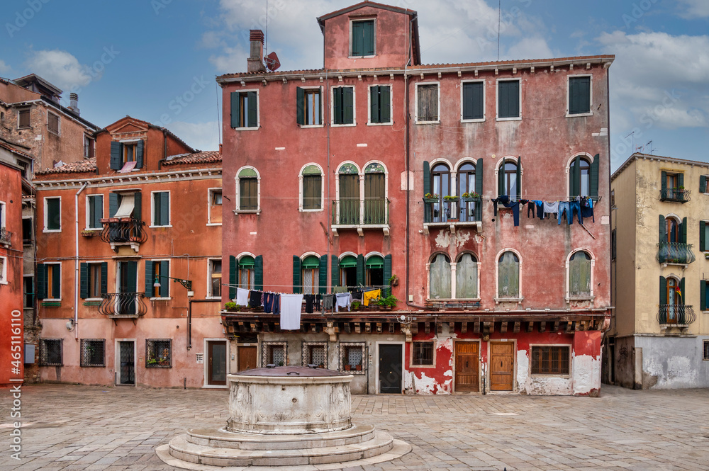 Clothes hang to dry on one of the many beautiful buildings in Venice