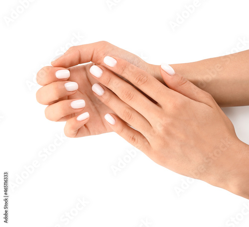 Woman with neat manicure on white background