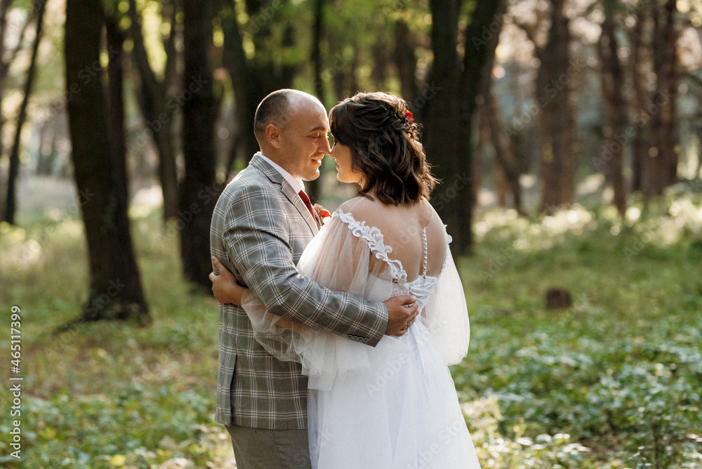 walk of the bride and groom through the autumn forest walk of the bride and groom through the autumn forest